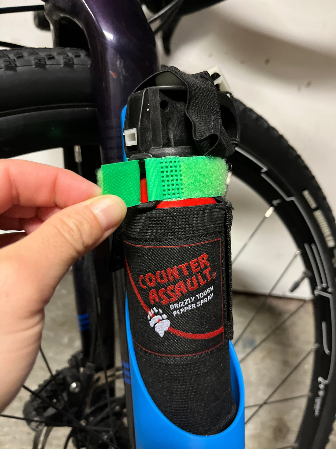Bike Bear Spray Holder on Water Bottle Cage Location