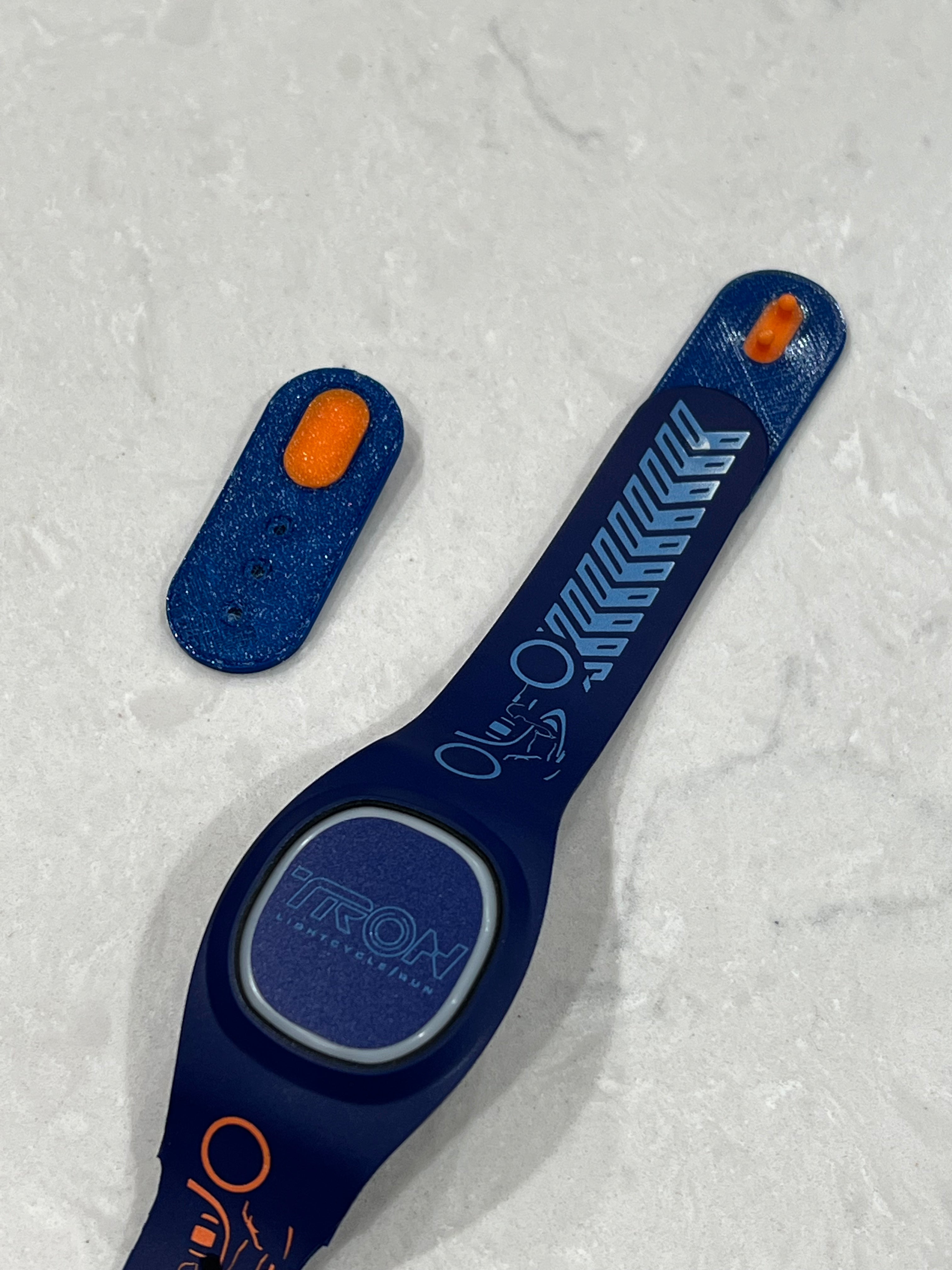 Back to Disney, but their kid grew out of their Magic Band!